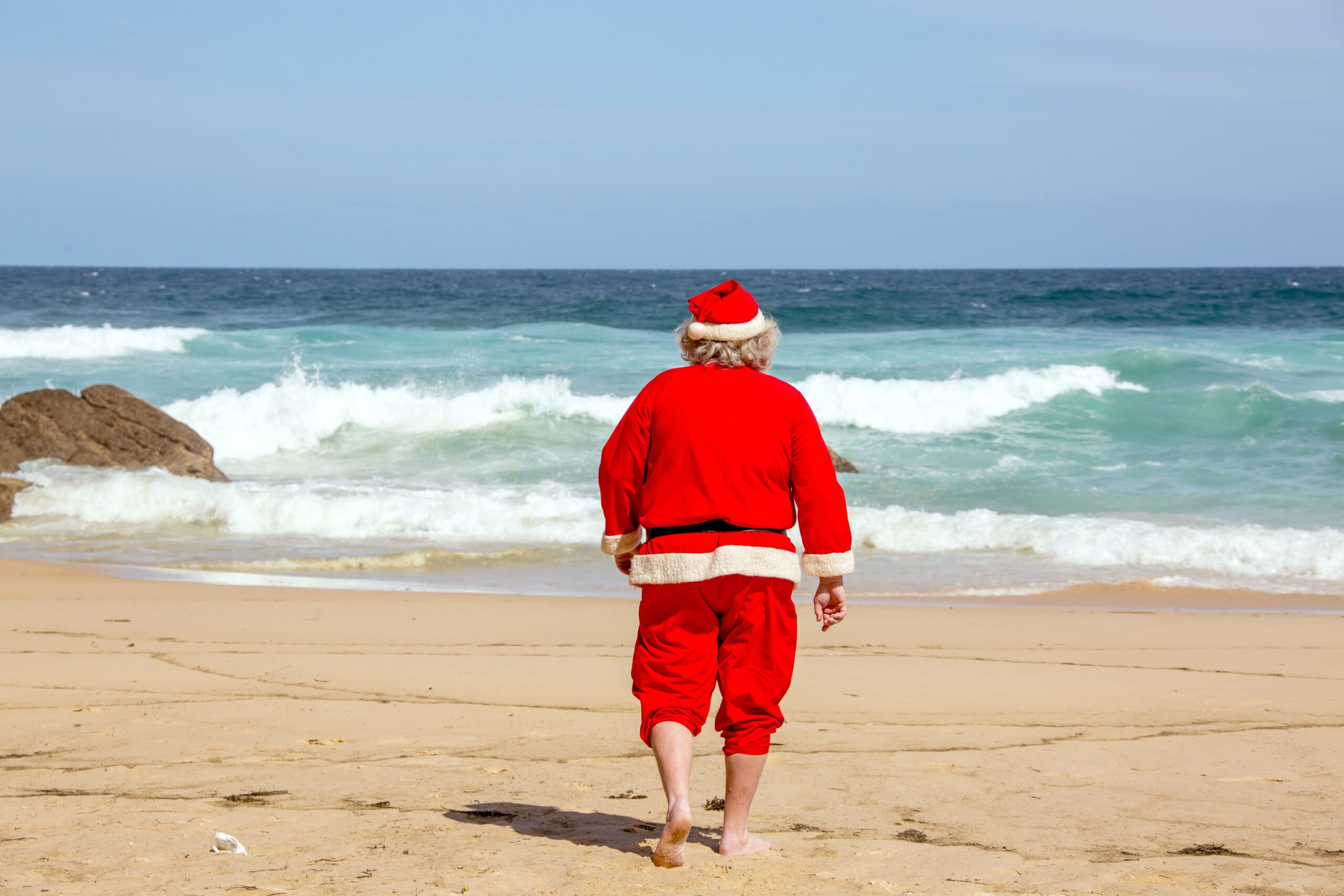 father christmas or santa beach australia expat