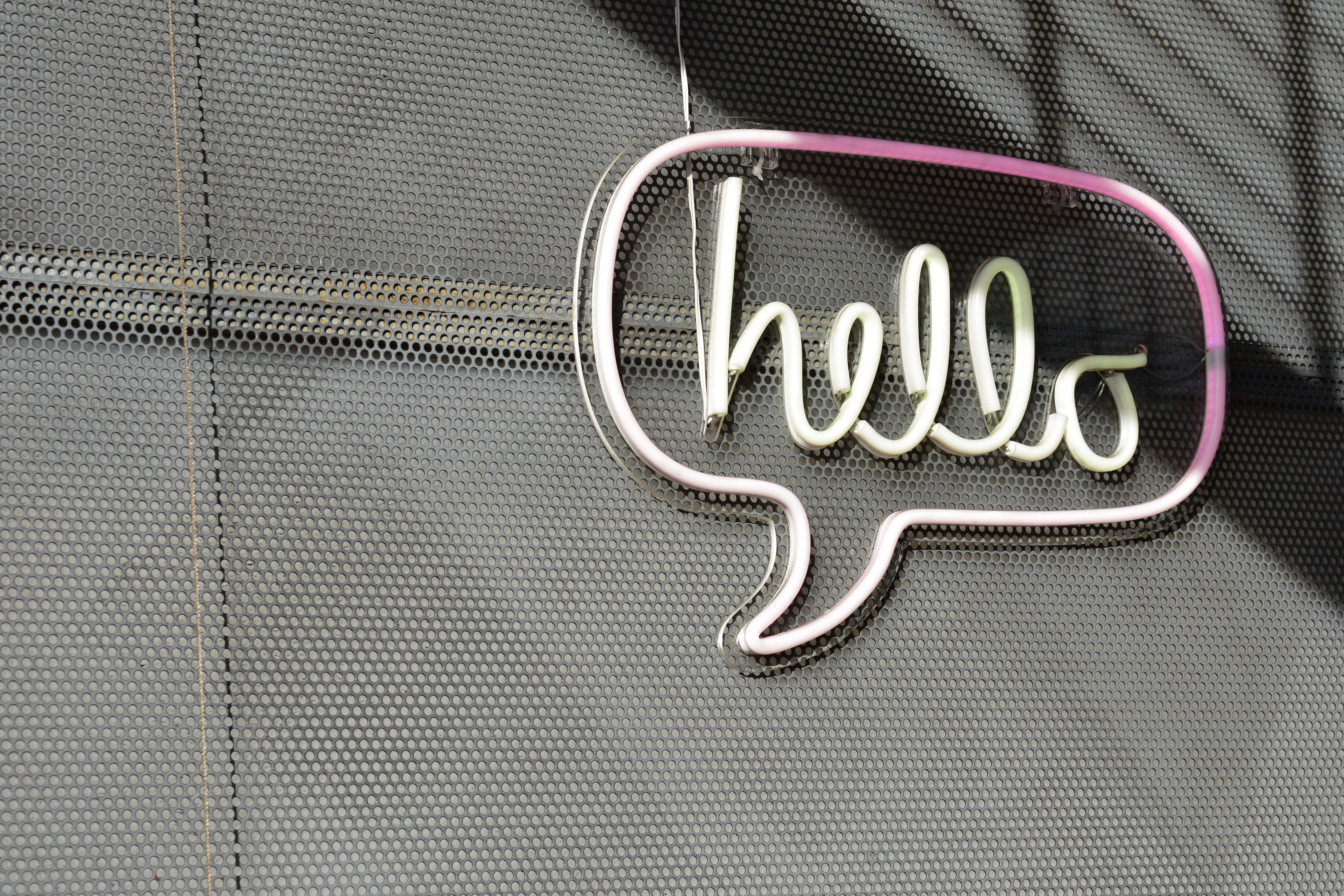 hello in neon lights expat communication