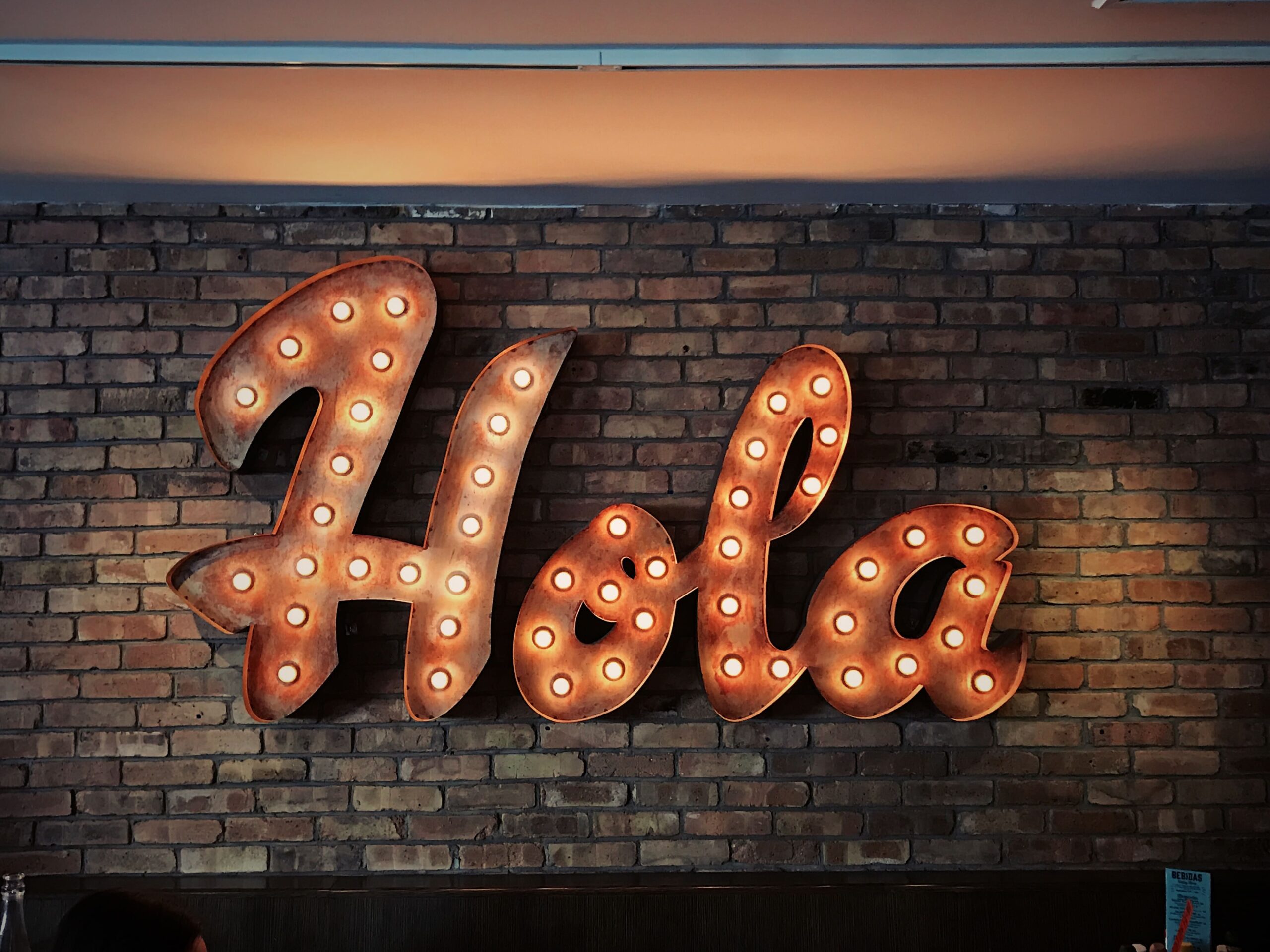 hola in lights learn spanish lessons free
