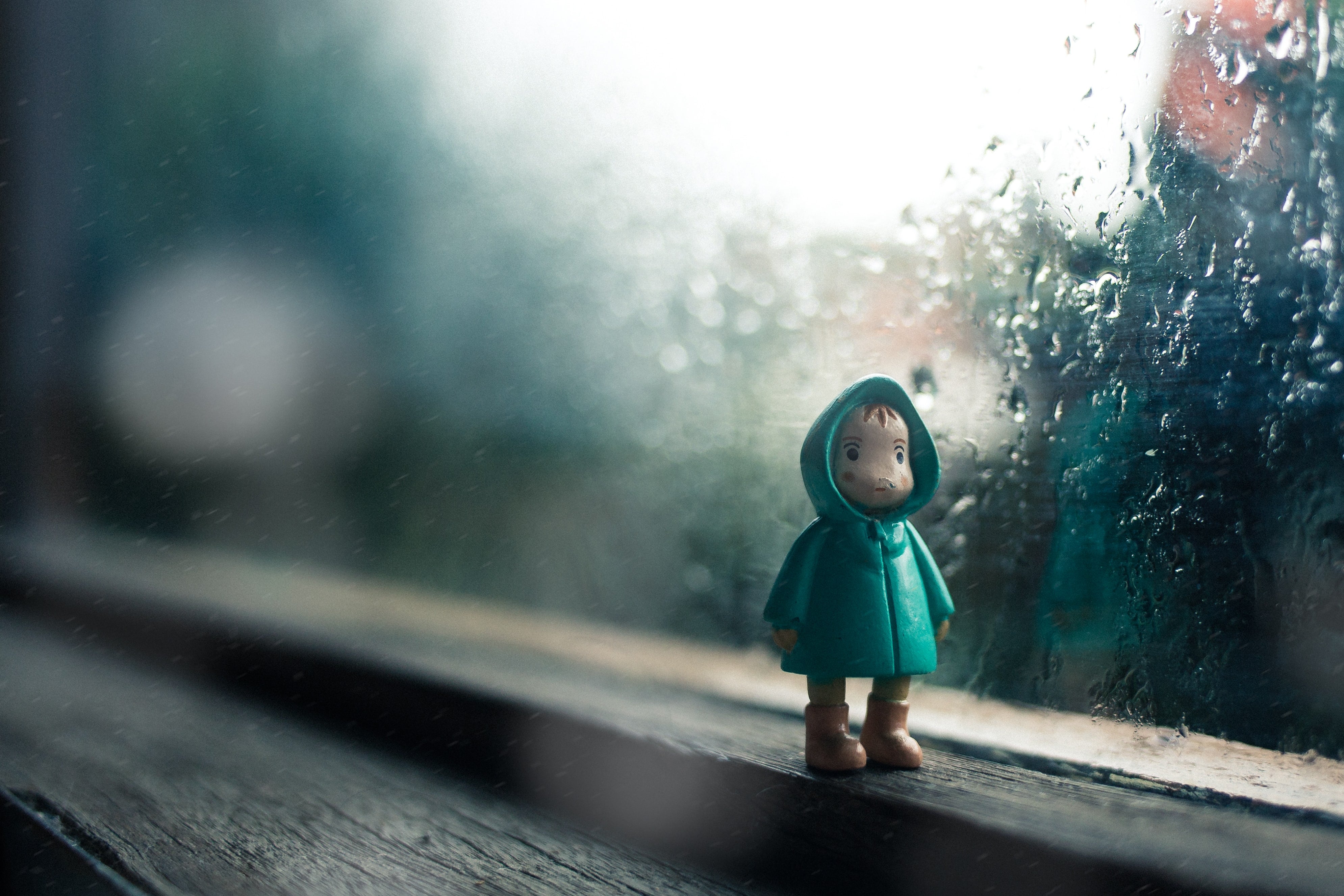 lonely figure rain living abroad